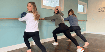 Be Moved Fitness members doing barre exercises in Western New York